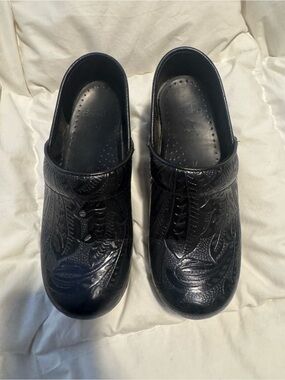 Dansko Black Embossed Leather Clogs